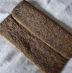 Gold beaded clutch